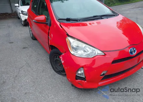 2014 Toyota Prius C One z USA, uszkodzony, nr VIN JTDKDTB36E1078936